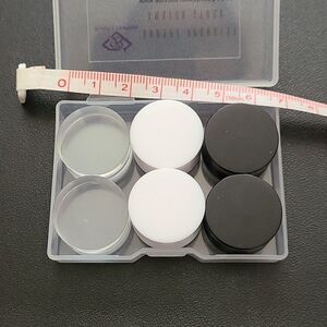 3 pairs of black, white and clear gauges 22mm by 12mm.